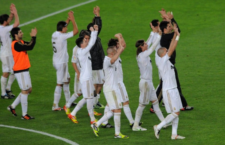 Real Madrid's players celebrate victory over Barcelona at the end of their Spanish first division &quot;El Clasico&quot; soccer match