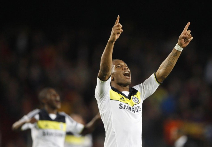 Chelsea&#039;s Didier Drogba celebrates after his team knocked off Barcelona to advance to the Champions League Final.