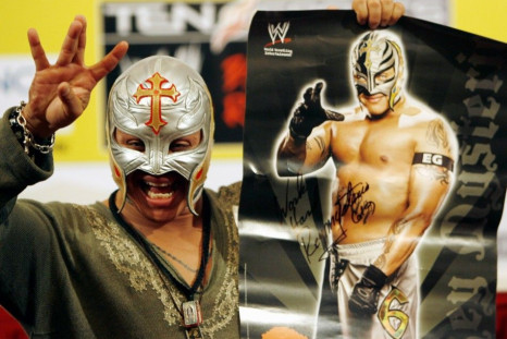 World Wrestling entertainer Rey Mysterio from the U.S. waves during a function in Mumbai