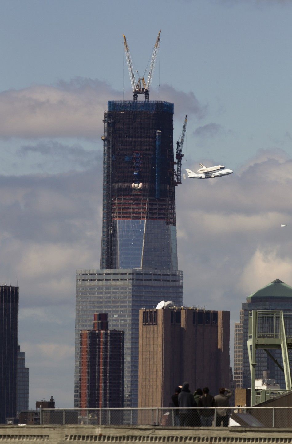 Space Shuttle Enterprise rides atop NASA modified 747 plane over New York