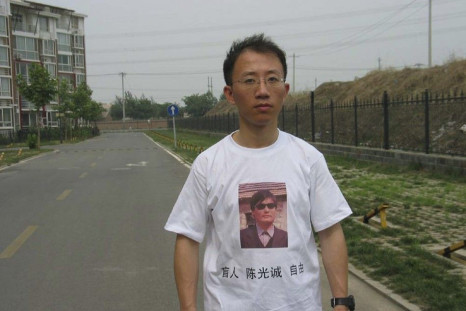 One of China's most prominent dissidents, Hu Jia, wears a shirt in support of blind Chinese lawyer Chen Guangcheng, in this undated handout.