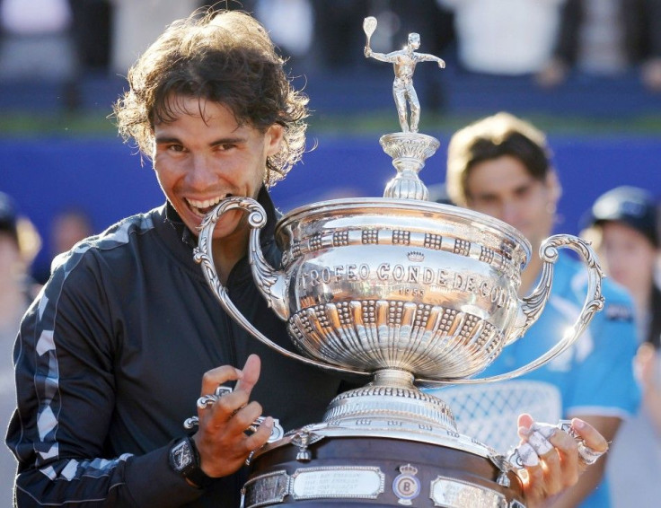 Rafael Nadal beat David Ferrer in straight sets to win his seventh Barcelona Open and maintain his clay-court form ahead of a potential tussle with Novak Djokovic at the French Open next month.