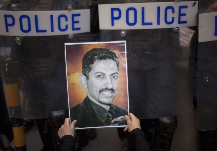 Bahraini hunger striker al-Khawaja attends court in wheelchair for retrial in capital Manama 