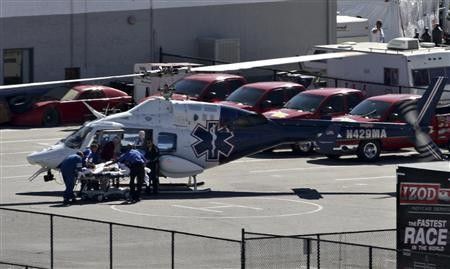 IndyCar driver Dan Wheldon is loaded into a medical helicopter after being injured in a multi-car wreck during the IZOD IndyCar World Championship race at the Las Vegas Motor Speedway in Las Vegas, Nevada