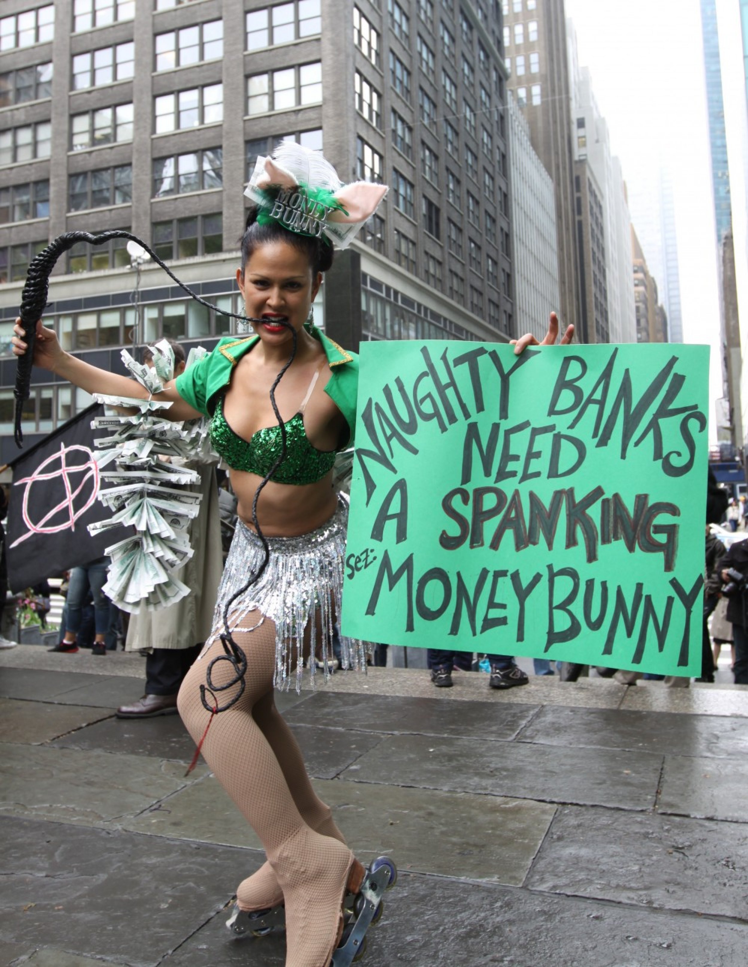 A demonstrator poses in New York039s Bryant Square during the morning039s May Day street action