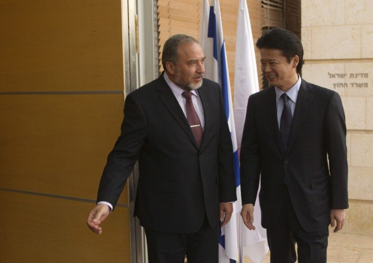 Israel&#039;s Foreign Minister Lieberman stands with his Japanese counterpart Koichiro Gemba in Jerusalem