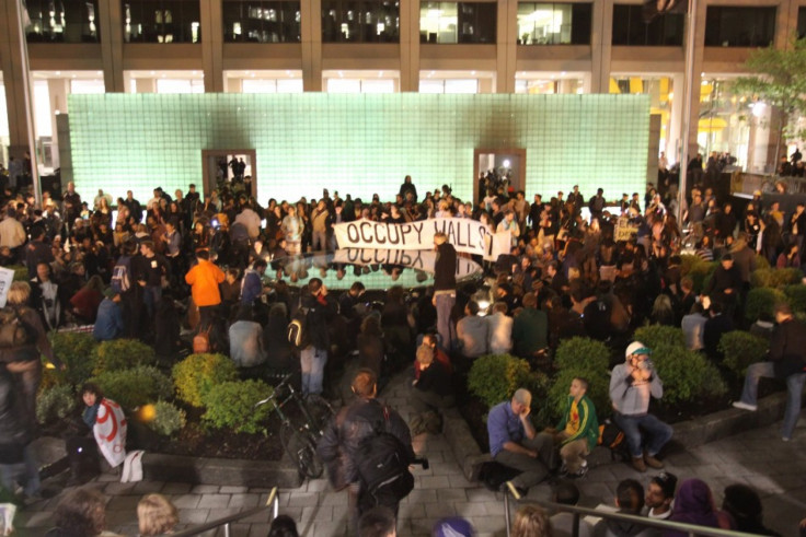Occupy Wall Street demonstrators gather at the Vietnam Veterans Memorial Plaza, on the city park site