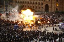 A view shows the explosion of gas-filled balloons during a campaign rally in the central Republic Square in Yerevan, May 4, 2012.