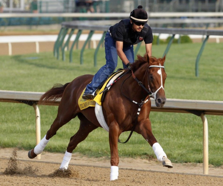 Kentucky Derby and Preakness winner I'll Have Another runs during a pre-race practice session.