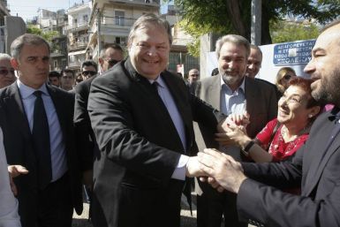 Leader of the Socialist PASOK party Venizelos arrives to vote at a polling station in Thessaloniki
