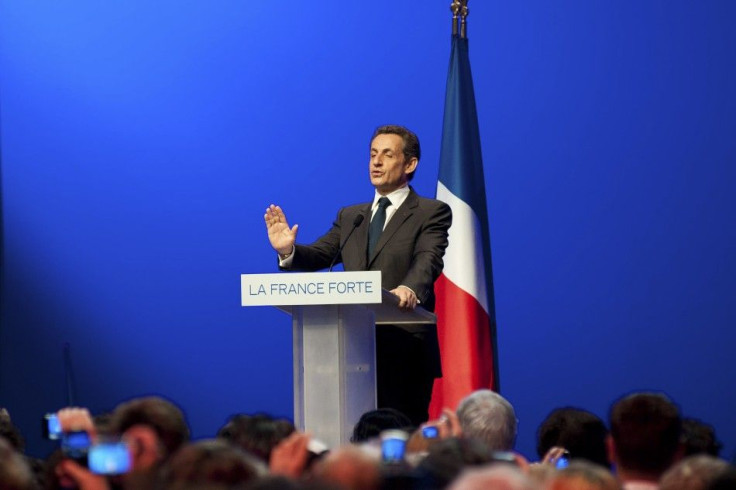 Nicolas Sarkozy, France's incumbent president, reacts after his defeat for re-election in the second round vote of the 2012 French presidential elections at the Mutualite meeting hall in Paris
