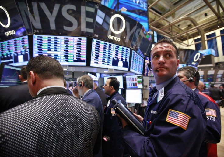 Traders work on the floor of the New York Stock Exchange on May 1, 2012.