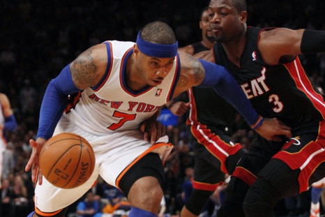 New York Knicks&#039; Carmelo Anthony drives past Miami Heat&#039;s Dwyane Wade in the fourth quarter of the Knicks&#039; win in Game 4 of their NBA Eastern Conference basketball playoff series in New York, May 6, 2012.