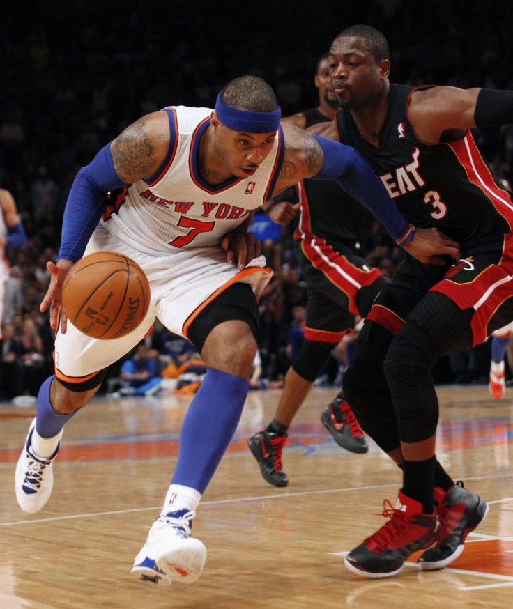 New York Knicks&#039; Carmelo Anthony drives past Miami Heat&#039;s Dwyane Wade in the fourth quarter of the Knicks&#039; win in Game 4 of their NBA Eastern Conference basketball playoff series in New York, May 6, 2012.