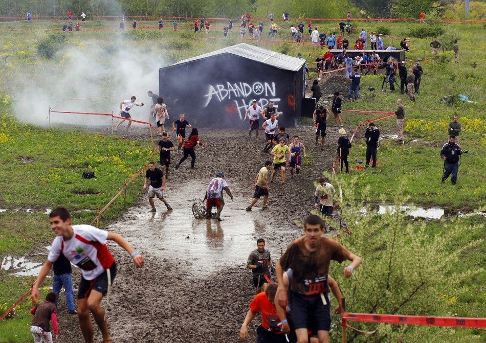 Zombies chase runners on the quotRun for Your Livesquot 5K obstacle course race in Amesbury