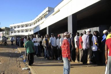 Residents queue up for sugar at a supermarket in the Malawian capital of Lilongwe