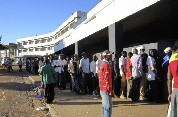 Residents queue up for sugar at a supermarket in the Malawian capital of Lilongwe