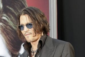 Cast member Johnny Depp poses at the premiere of the film &quot;Dark Shadows&quot; at the Grauman's Chinese theatre in Hollywood, California May 7, 2012.
