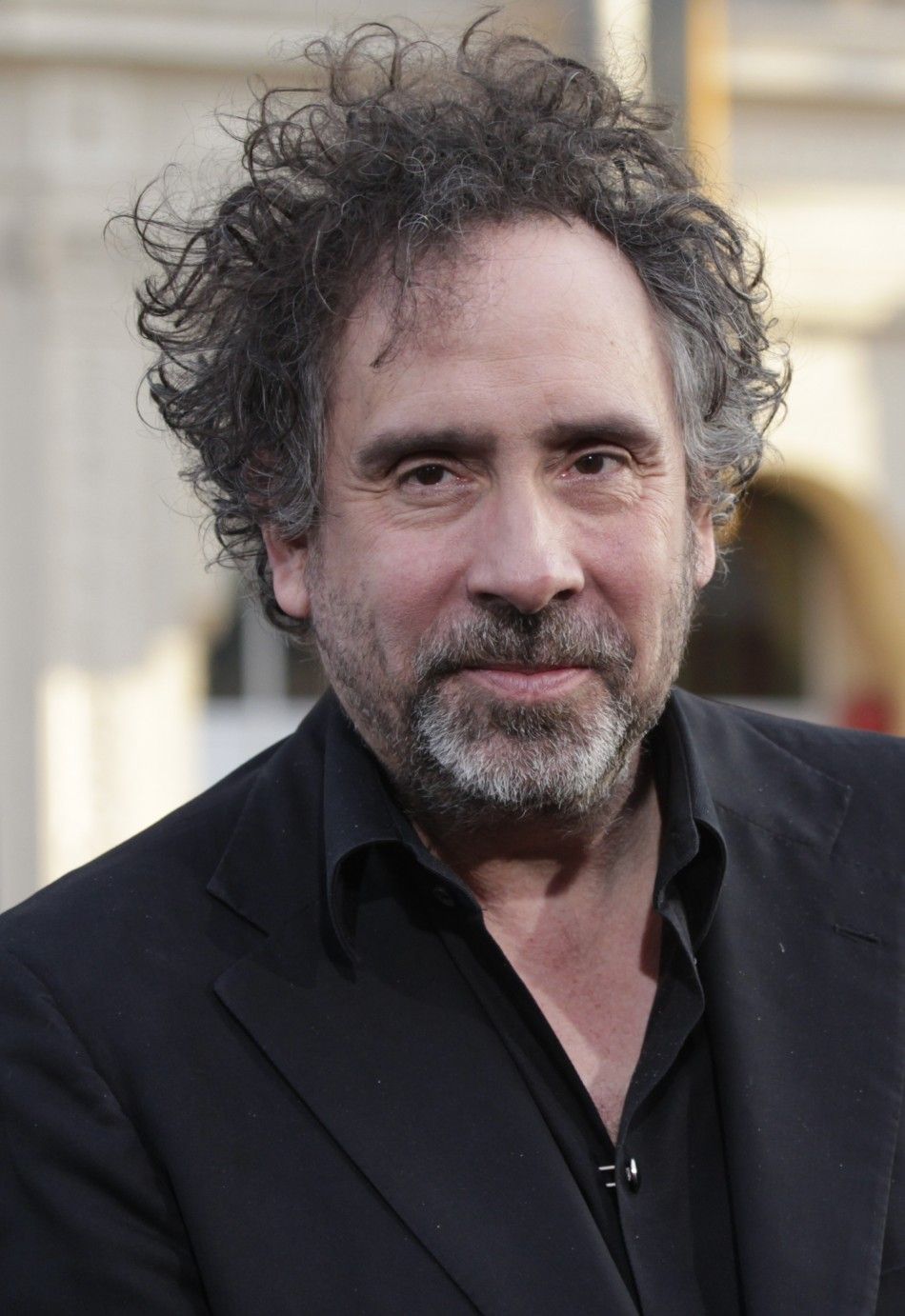 Director of the movie Tim Burton poses at the premiere of quotDark Shadowsquot at the Graumans Chinese theatre in Hollywood, California May 7, 2012.