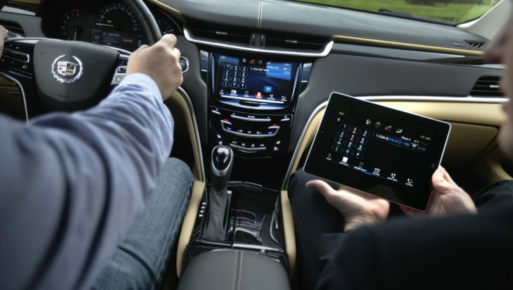 The new CUE system in the 2013 Cadillac XTS and accompanying iPad app.