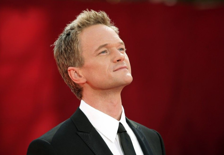 1.Show host and nominee Neil Patrick Harris arrives at the 61st annual Primetime Emmy Awards in Los Angeles