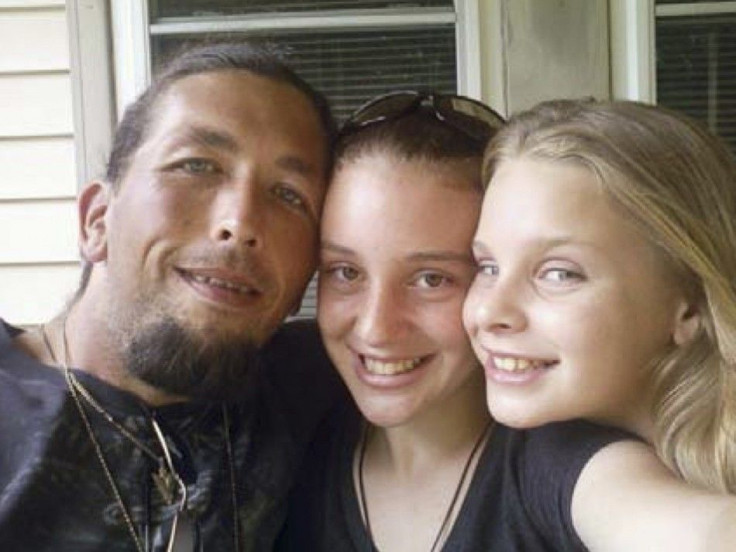 Adam Mayes is shown with Adrienne and Alexandria Bain in this undated handout photo released to Reuters by the Tennessee Bureau of Investigation