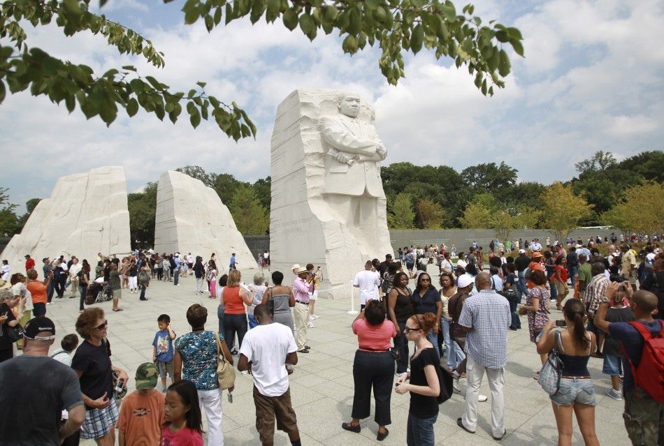 Visitors gather around the Martin Luther King, Jr. National Memorial in Washington August 26, 2011