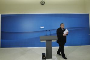 Socialist PASOK party leader Venizelos walks towards the exit after a news conference at the parliament in Athens