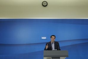 Greece&#039;s Left Coalition party head Tsipras addresses reporters during a news conference after a meeting with Socialist PASOK party leader Evangelos Venizelos at the parliament in Athens