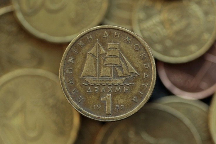 A drachma coin is seen on display in this photo illustration taken in Athens May 9, 2012.