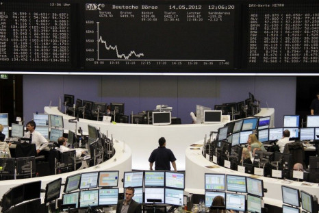 Traders work the floor of the Frankfurt Stock Exchange