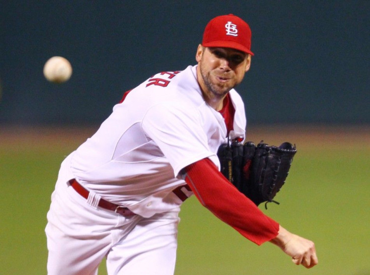 St. Louis Cardinals starting pitcher Chris Carpenter faces the Milwaukee Brewers in the 1st inning of Game 3 of the MLB National League Championship Series baseball playoffs in St. Louis