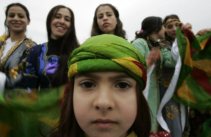 Kurds attend a gathering to celebrate Newroz in southeastern Turkish city of Diyarbakir