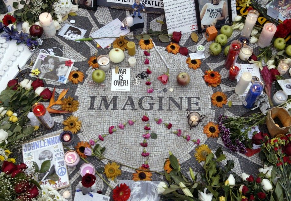 Memorabilia lie on circle with the word Imagine on it to honor deceased John Lennon in Central Parks Strawberry Fields in New York December 8, 2005.