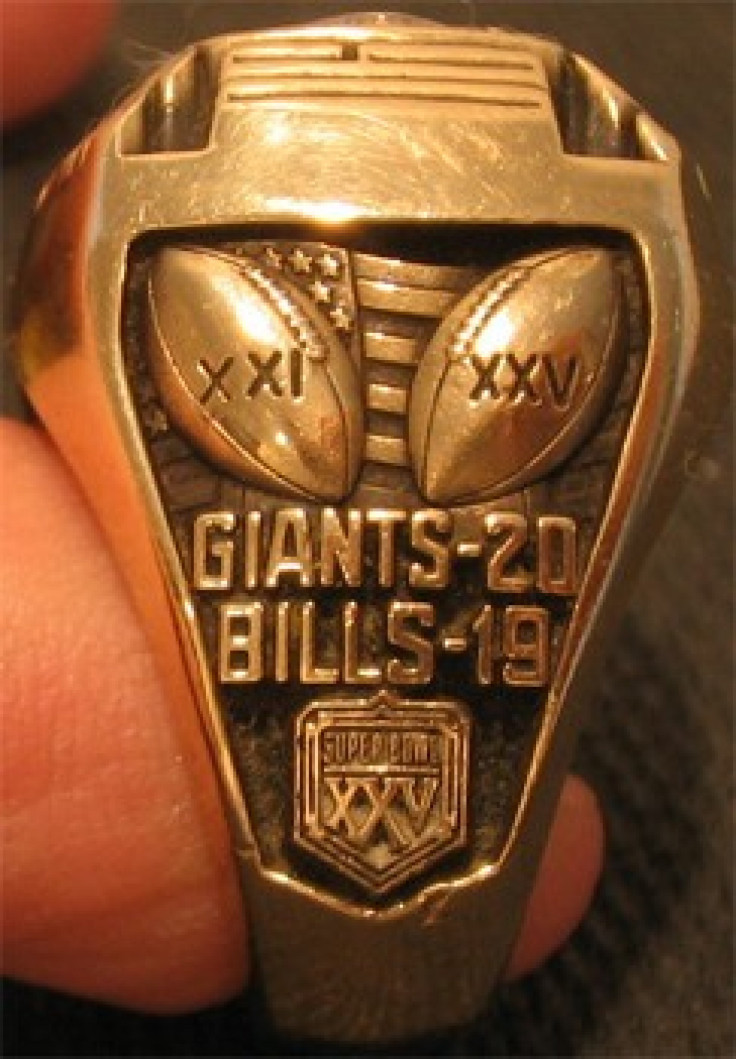 The side view of a Super Bowl XXV ring.