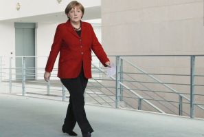 German Chancellor Merkel arrives to make a statement at the Chancellery in Berlin