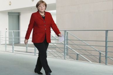 German Chancellor Merkel arrives to make a statement at the Chancellery in Berlin