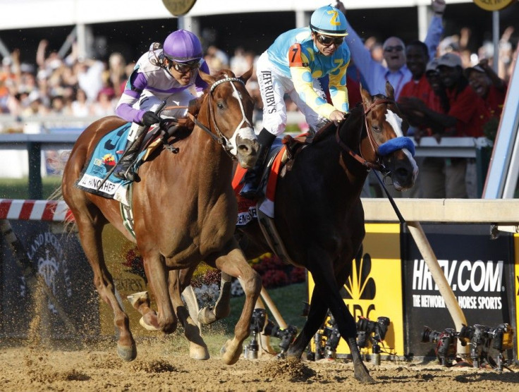 I'll Have Another with jockey Mario Gutierrez in the irons (L) edges out Bodemeister with jockey Mike Smith in the irons to win the 137th running of the Preakness Stakes at Pimlico Race Course in Baltimore, Maryland May 19, 2012.