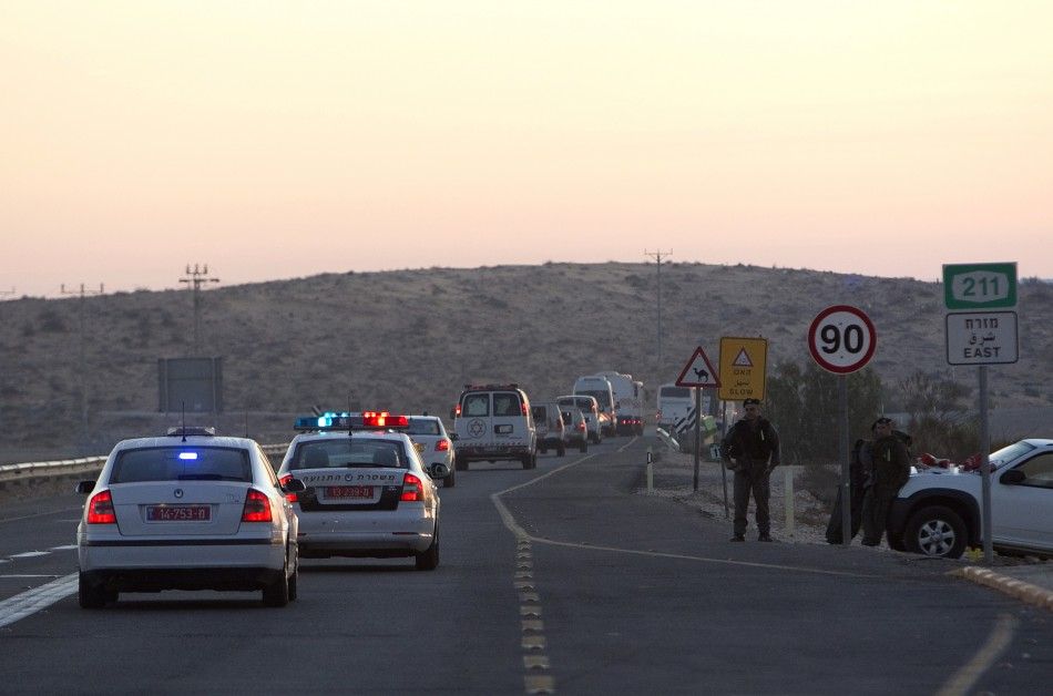A convoy carrying Palestinian prisoners is seen as it leaves the Ketziot prison in southern Israel October 18, 2011.
