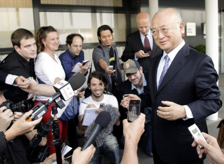 International Atomic Energy Agency (IAEA) Director General Yukiya Amano briefs the media after his trip to Tehran at the international airport in Vienna