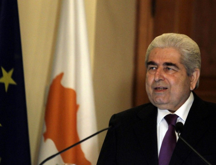 Cypriot President Demetris Christofias addresses the media in Cyprus