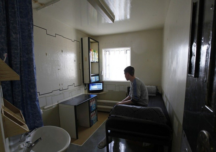 A prisoner sits in his cell on the resettlement wing in Doncaster Prison