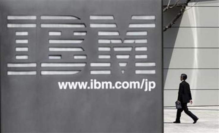 A man walks past the headquarters of IBM Japan in Tokyo