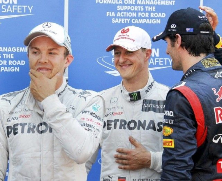 Michael Schumacher (M), Nico Rosberg (L) and Mark Webber