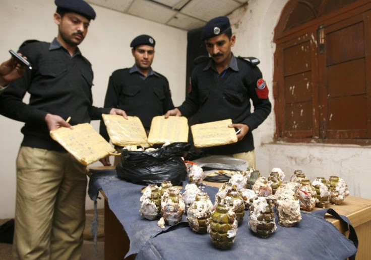 Police display explosives and drugs confiscated from six arrested Tehrik-e-Taliban Pakistan members during a news conference in Lahore
