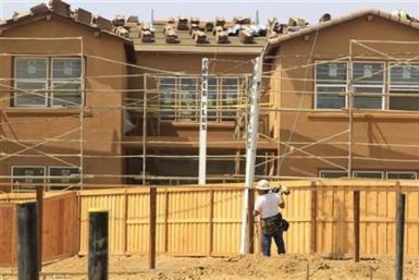 New residential homes are shown under construction in Carlsbad