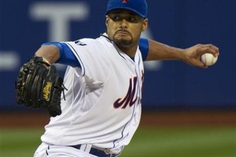 New York Mets starting pitcher Johan Santana throws a pitch to the St. Louis Cardinals in the first inning of their MLB National League game at CitiField in New York, June 1, 2012.