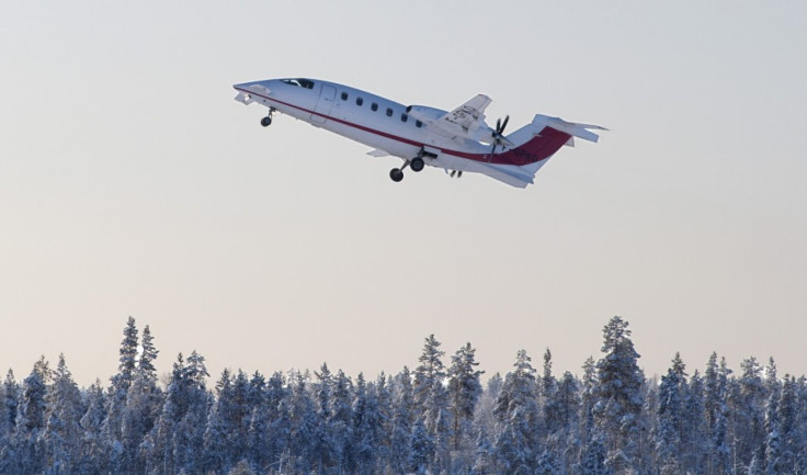 The Piaggio Aero P180 Avanti II in flight.