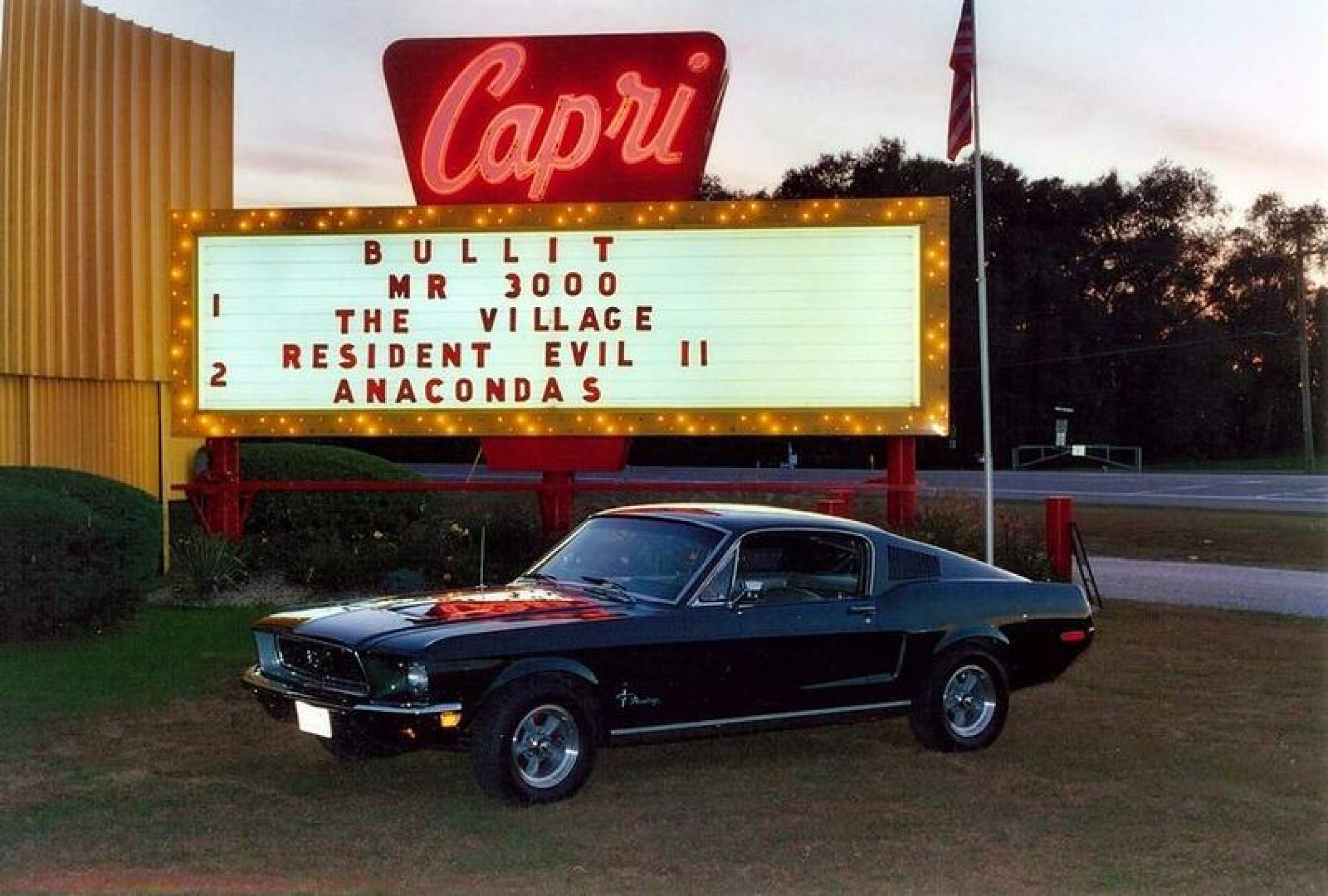 A Bullitt Ford Mustang replica at the Capri Drive In Theater in Coldwater, Michigan, during a showing of Bullitt at their 40th anniversary in 2004
