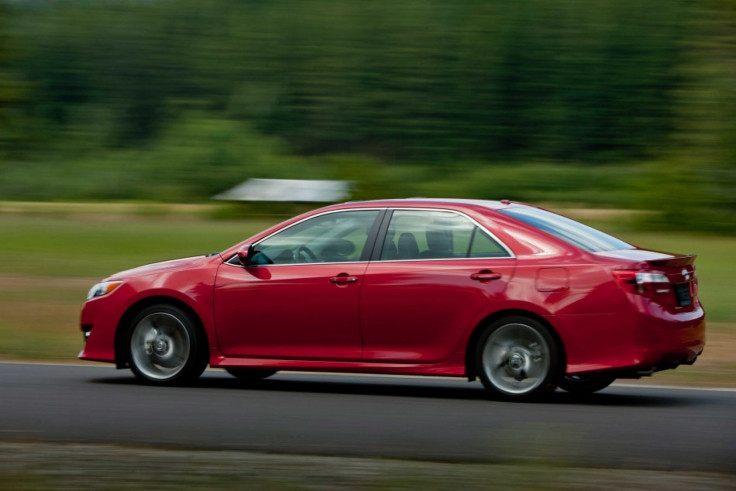 A 2012 Toyota Camry production car seen from the side.